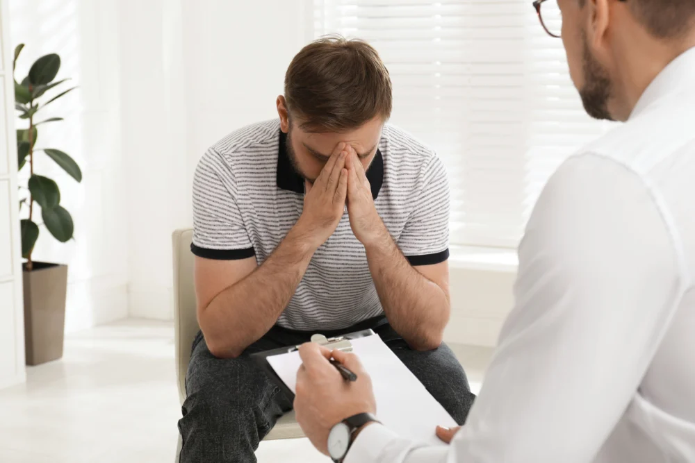 Patient speaking with a provider about fentanyl detox Georgia withdrawal support.