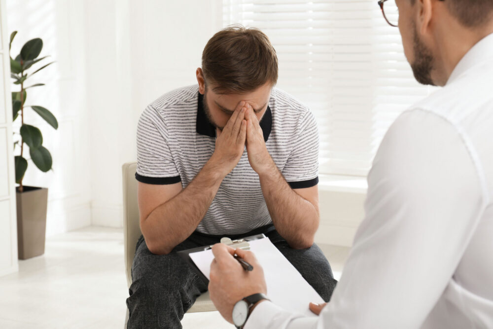 Patient speaking with a provider about fentanyl detox Georgia withdrawal support.