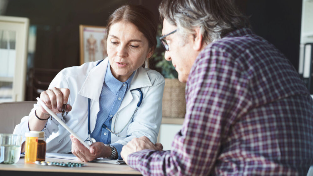 Medical provider explaining medication support for fentanyl detox Georgia care.